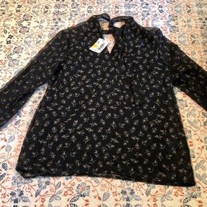 Shear and black floral blouse. New with tags!